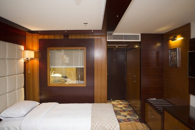 1 Night Nile Cruise from Aswan to Luxor - Aswan start: 11 am pickup, room check-in, and lunch onboard