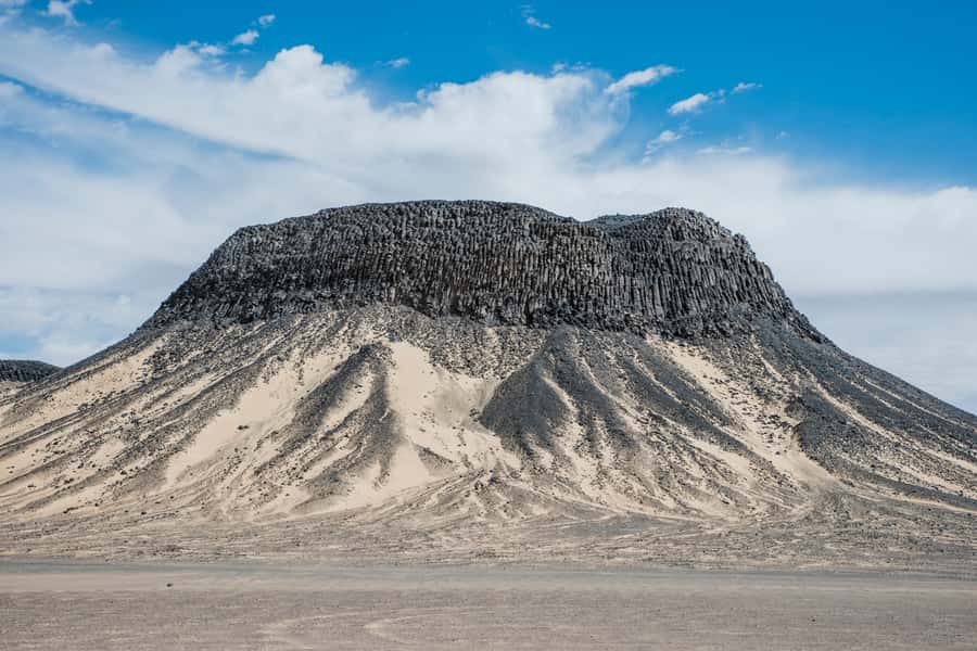 Cairo: 2-Day Bahariya Oasis Camp and Desert Tour - Black Desert volcanic hills and the sulfur-water swim reality