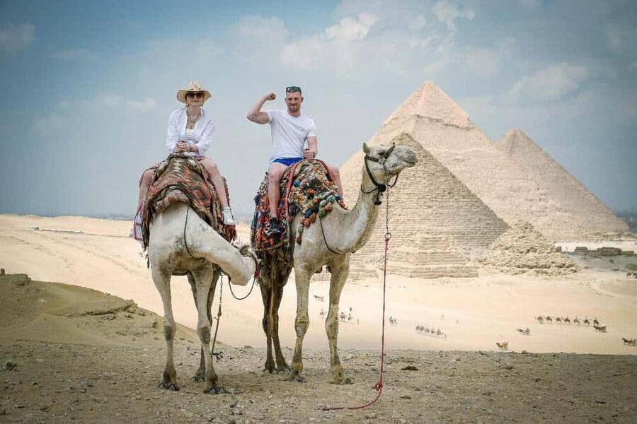 Cairo Day Tour: Pyramids, Museum, Camel Ride & Local Lunch - A camel ride option with real desert views