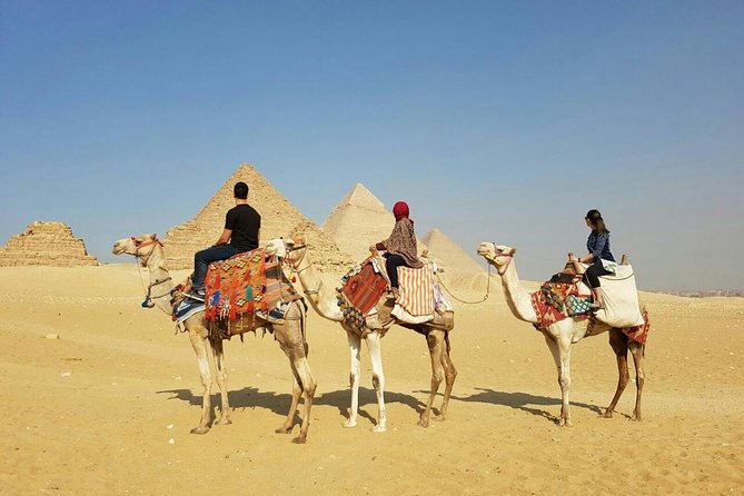 Cairo Full-Day Tours to Giza Pyramids ,Egyptian Museum & Bazaar - Entering Giza: Pyramids, Valley Temple, and the Sphinx Stop Right Away
