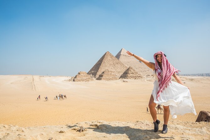 Cairo Guided Half-Day Tour of Giza Pyramids and Sphinx - Stop 1: Pyramids of Giza, Khufu, Khafre, and Menkaure in a focused hour