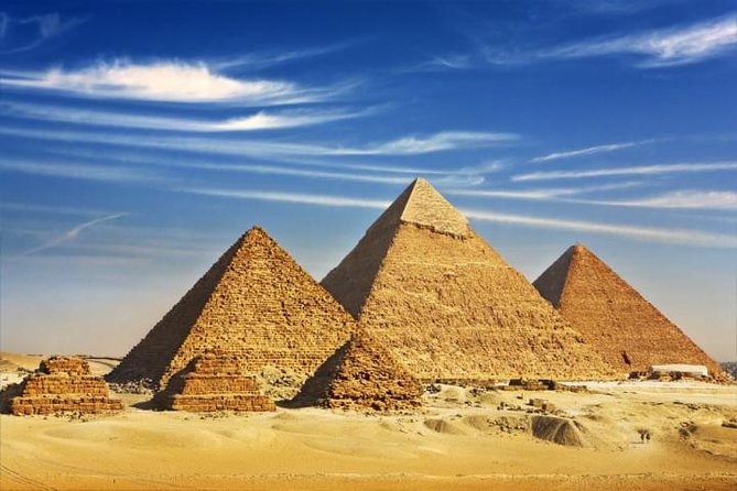 Cairo Layover Tour to Giza Pyramids Egyptian Museum and Khan Khalili Bazaar - Close to Cheops: Great Pyramid of Khufu in the flow