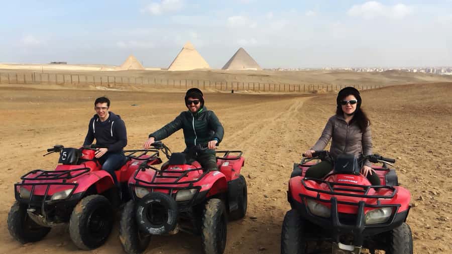Cairo: Private Quad Bike Desert Tour with Pyramids & Sunset - Riding dunes with Cheops, Chephren, and Mykerinos in view