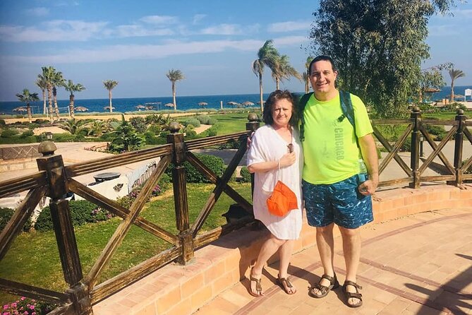 Day-Tour to the Red Sea from Cairo - Dome Marina Hotel beach time: chairs, umbrellas, and changing rooms