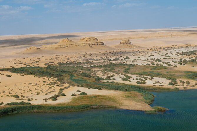 Fayoum Oasis Adventure 4WD Desert Safari with Traditional Lunch - Bedouin camp: BBQ, cardemom tea, and sandboarding