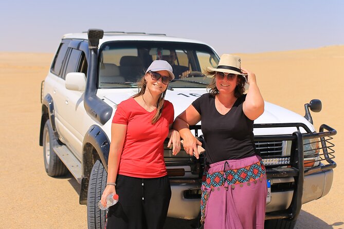 From Cairo 4x4 Safari, Camel Ride, Magic Lake, Waterfalls & Lunch - The adrenaline window: 4x4 dune bashing and sandboarding
