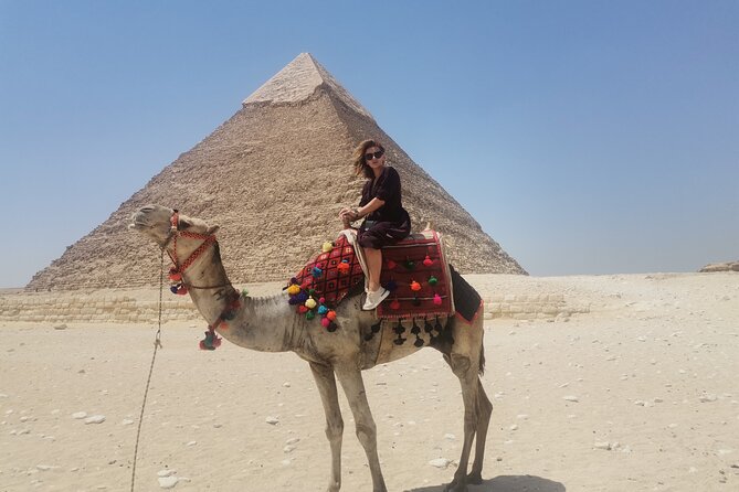 Full-Day Tour to Giza Pyramids, Memphis, and Saqqara with lunch - Stop 1 at Giza: Pyramids, Sphinx, solar boat, and the camel option