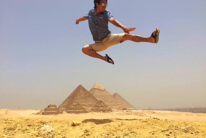 Full Day Tour to Giza Pyramids with Camel Ride and Egyptian Museum in Cairo - The Great Sphinx: Where History Meets a Big Question