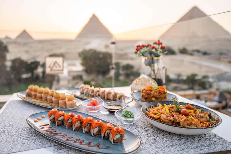 Giza: Dinner with Pyramids All Around You at Rooftop7000 - Dinner at The Great Pyramid Inn: what is included and how to plan