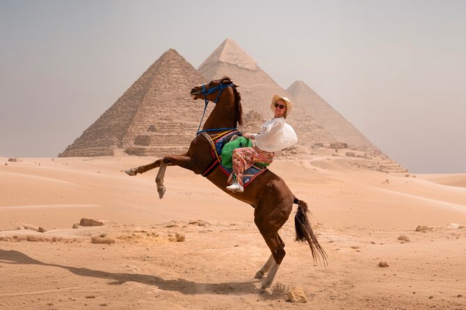 Giza Pyramids Photoshoot with Jumping Horse, Camel and Sphinx - Stop 2: panoramic views, camel ride, and the jumping horse photoshoot
