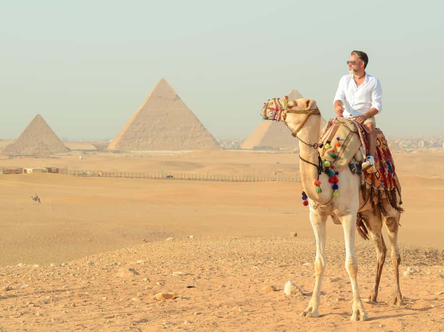 Giza Sunrise Pyramid Guided Tour With Camel Ride & Breakfast - Choosing the 5 AM sunrise versus the 8 AM morning start