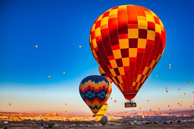 Guided Hot Air Balloon Tour in Luxor - Stop 1 at the Nile boats: crossing with snacks and warm drinks