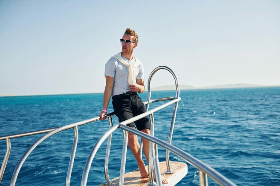 Hurghada: Orange Island Yacht Trip with Lunch & Water Sports - Orange Bay beach time: sand, sun, and a simple escape