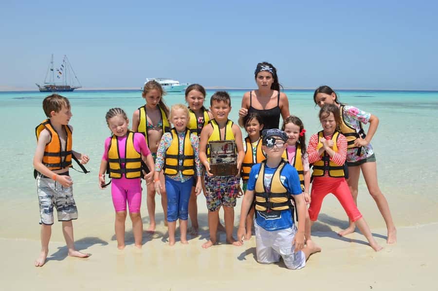 Hurghada: Pirates Sailing Boat to Orange Bay with Transfers - For Families: Kids Animation, Crew Energy, and Suitability
