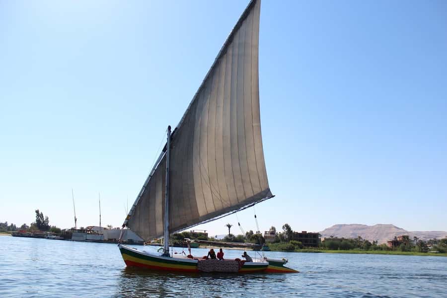 Luxor: Private Felucca Boat Trip with Hotel Pickup - Getting on board: felucca comfort, safety, and what the crew does