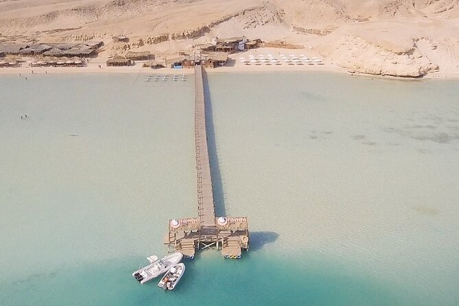 Orange Bay Island Snorkeling Trip With Water Sports - Hurghada - Two reef snorkeling stops with equipment, guide help, and time control