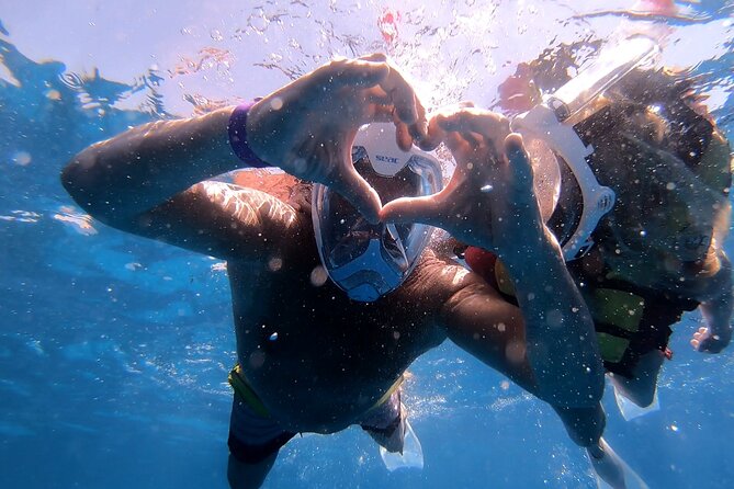 Orange Bay Island Tour - Stop 1 at Orange Bay Island: Beach time plus your first snorkeling session