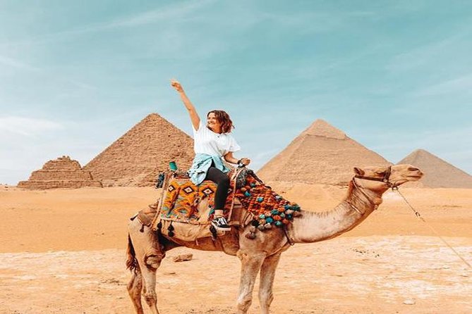 Private Experienced Tour for Camel ride during the sunset with Local Bedouin Dinner - Seeing the Great Pyramid area from the sand, and why timing matters