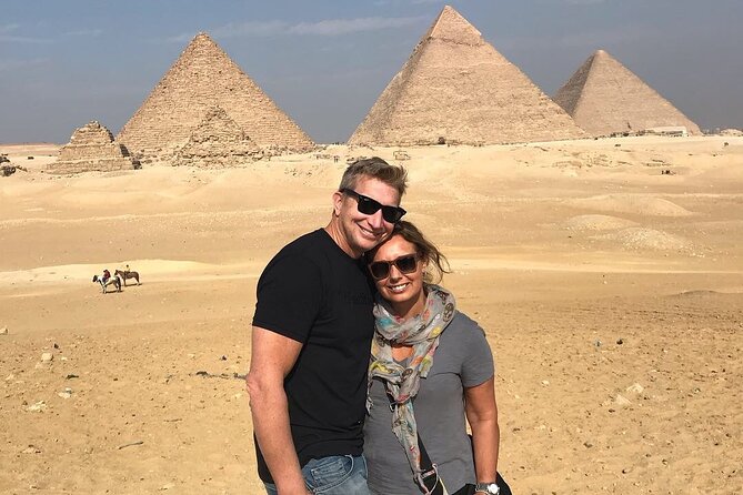 Private Full-Day Tour to Giza Pyramids,Sphinx,Memphis, and Saqqara - Great Sphinx and the camel photos: where the day turns cinematic