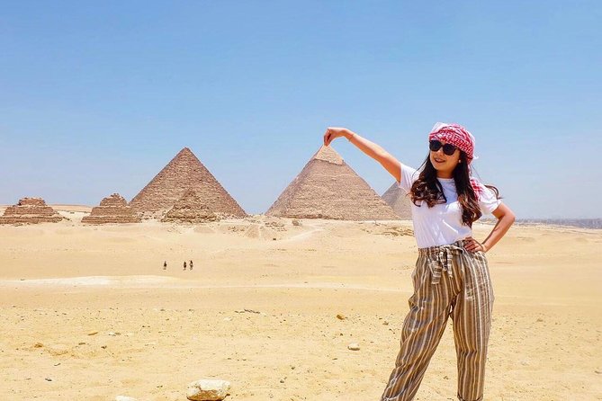 Private Full-Day Tour Visiting Giza Pyramids, Egyptian Museum and Old Market - Optional extras: inside pyramids, lunch koshari, and camel-cost reality