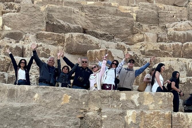 Private tour Giza Pyramids ,sphinx & camel ride all included - Panoramic pyramid views, then a camel ride into the action
