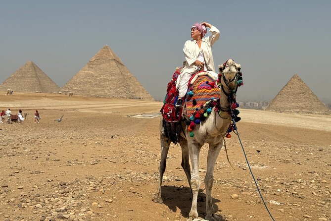 Private tour Giza Pyramids ,sphinx & camel ride all included - Stop at Khufu’s Great Pyramid: what you should notice first