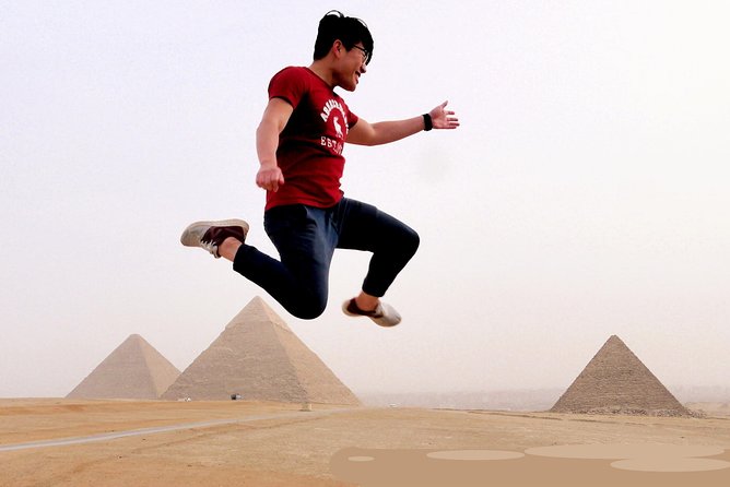 Sightseeing Day Tour to Pyramids, Egyptian Museum and Bazaar from Giza or Cairo - Giza Plateau: Great Pyramids views, Valley Temple, and the Sphinx