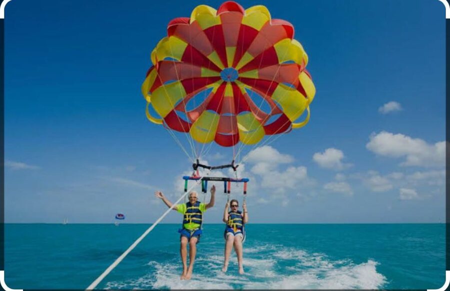Speedboat,Parasailing, Snorkeling & Piece Of Paradise Island - Orange Bay and Magawish Island beaches, plus reef time