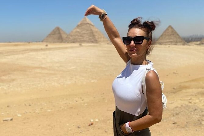 Tour to great pyramids of Giza, Sphinx & shopping tour with lunch - Entering Giza: Pyramids of Khufu, Khafre, and Menkaure, Plus a Panorama Shot Zone