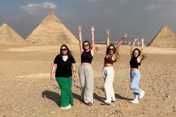Vip Tour Giza pyramids, sphinx with Camel Ride and Vip lunch - The Pyramids of Giza stop: Khufu, Khafre, Menkaure, and the panorama photo moment